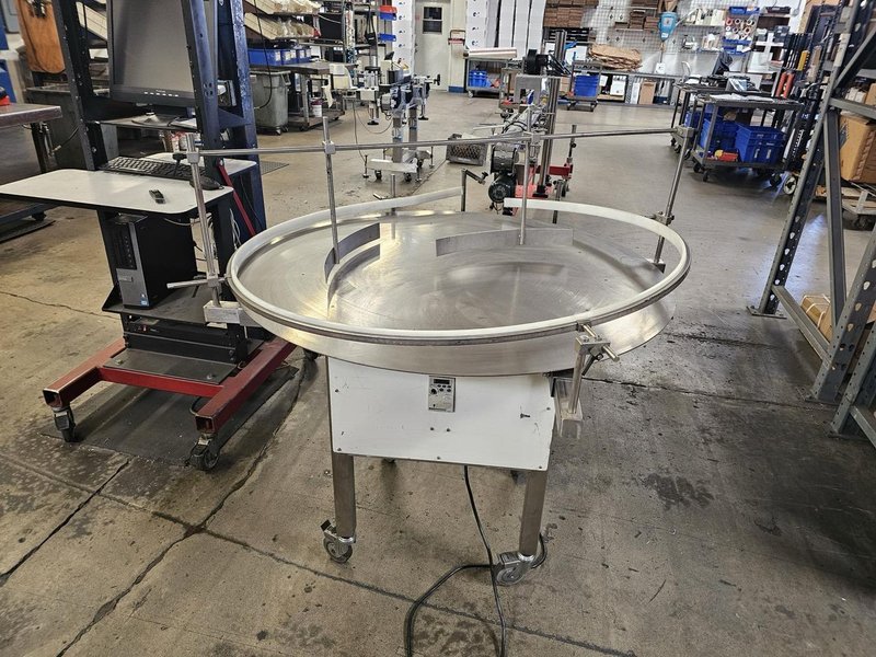 Accutek Bottling Line with Chadam Consultants 2 Head Gravity Filler, Accutek SA-1 Automatic Chuck Capper, Accutek APS106 Labelette Labeler, Everfilt Oil Filtration System, IBC Tanks