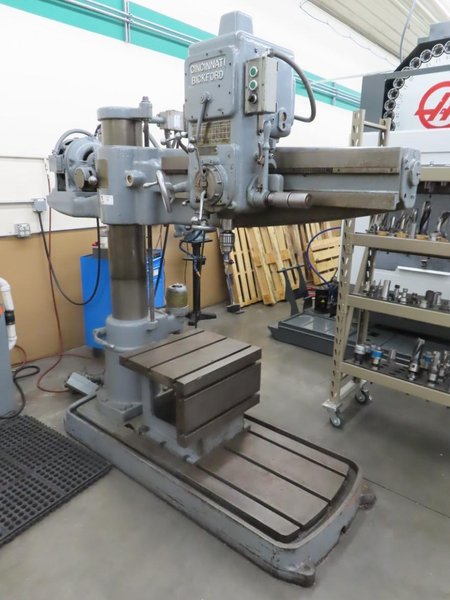Cincinnati Bickford 4' x 9" Radial Arm Drill, Box Table, Power Elevation, Power Quill Feed, Coolant- Auction Item