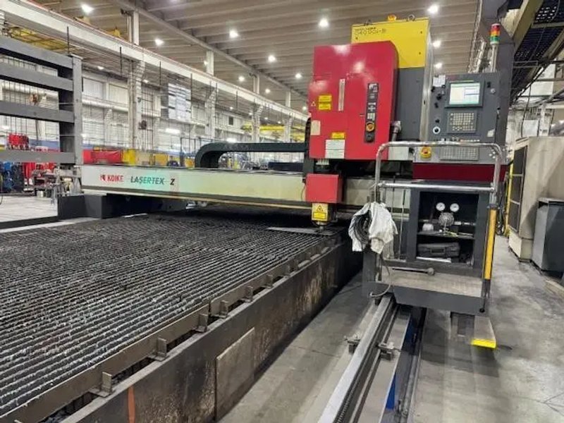USED KOIKE 10' X 100' CO2 PLATE LASER WITH (2) 4,000 WATT RESONATORS, Year: 2007