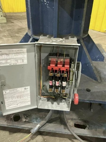 20,000 LBS X 54" SECO COIL TAKE OFF STORAGE POWERED ROTATION TURNSTILE. STOCK # 0537026
