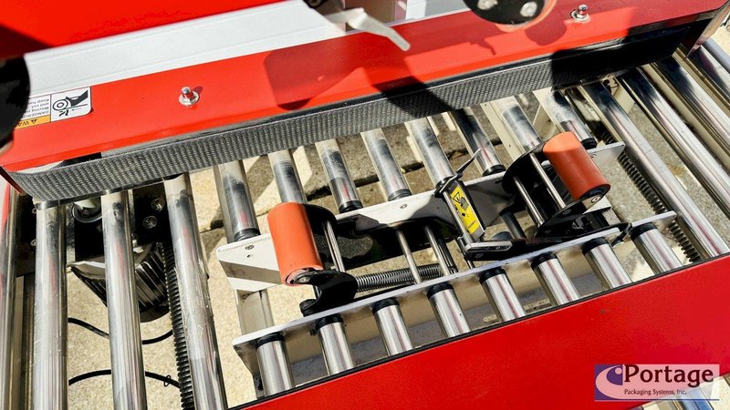 Eagle T100 Carton Sealer  |  Side Driven Belts  |  Top and Bottom 3” Tape Heads  |  Adjustable Carton Sealer
