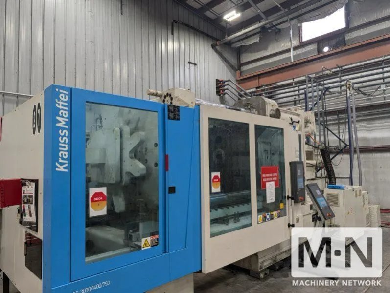 650 TON KRAUSS MAFFEI MODEL CXZL 650-3000/1400/750  THREE SHOT INJECTION MOLDING MACHINE MFG 2010
