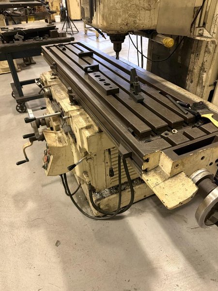 65" X 15" OKK MH-3VII 10HP VERTICAL MILLING MACHINE. STOCK # 1085526