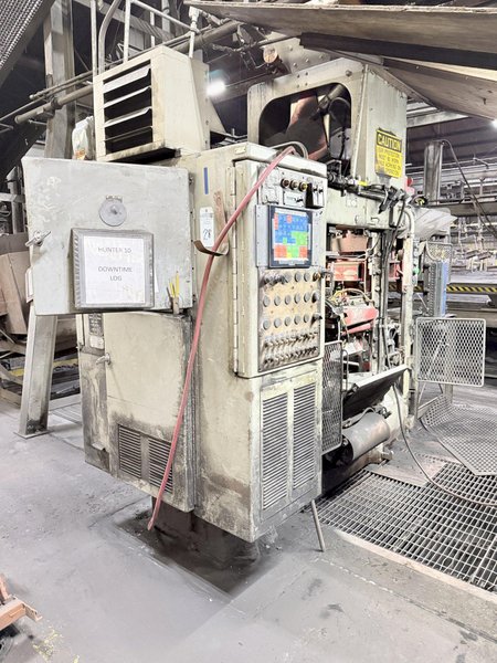 Hunter model hmp 10C automatic molding machine s/n 82P928, op. with Emerson PLC, feed belt