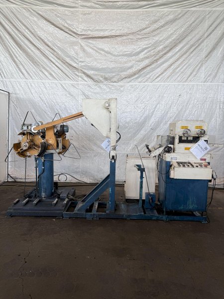 1,100 Lb. x 6" x .05" AIDA SERVO FEEDLINE W/ DUAL UNCOILER. STOCK # 0130225.