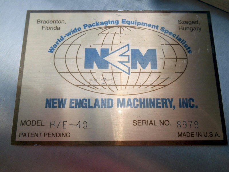 New England Machinery | S.S. Bottle Unscrambler w/ S.S Incline Conveyor