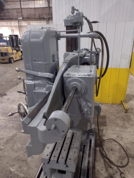4' X 9" CARLTON 1A RADIAL ARM DRILL. STOCK # 0992325
