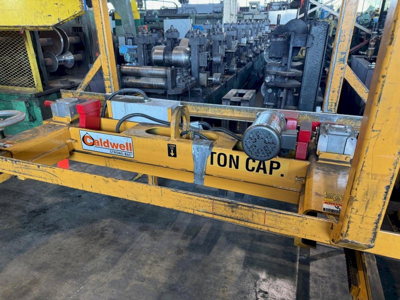 10,000 LB X 96" L X 48" W CALDWELL POWERED ADJUSTABLE SHEET LIFTER. STOCK # 0872024