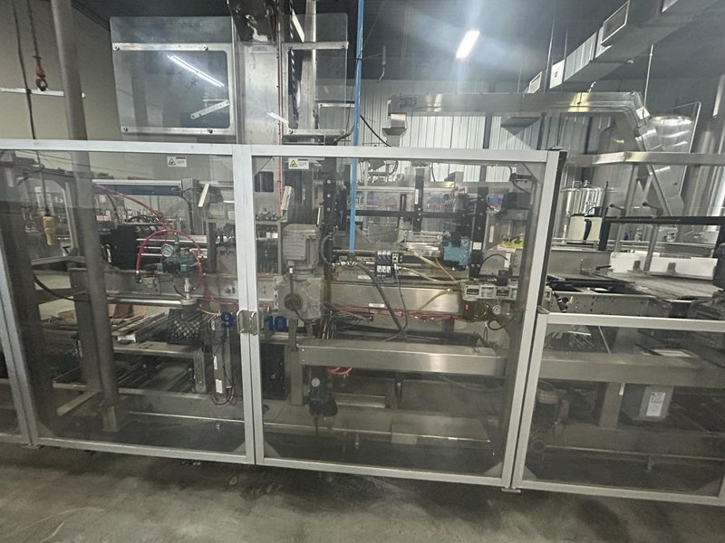 48-Head KHS Rotary Short-Tube Bottle Rinser, Filler, Crowner with Complete Used Bottling Line including Depalletizer, Labeler, Crown Elevator, Case Packer, Case Erector, Carrier Erector, &amp; More, 2013