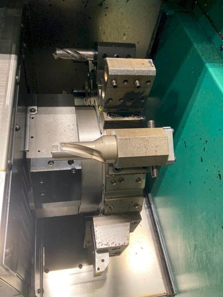 Nakamura-Tome WT-250 CNC Lathe, 2001 – Twin Turret, Chip Conveyor, Parts Catcher
