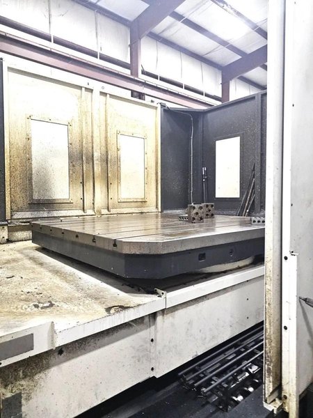 Kuraki AKB-13 5″ Spindle Horizontal Boring Mill, 2015 – Fanuc 0iMB Control 5 Axis Control, 60 ATC, 1000 psi TSC, Rigid Tap, Full B Axis 360 Degree Rotary Table, Barnes Chip/Coolant Separator w/ Lift Up Conveyor