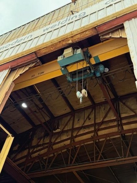10 TON X 55' DEMAG SINGLE GIRDER TOP RUNNING BRIDGE CRANE. STOCK # 0113726