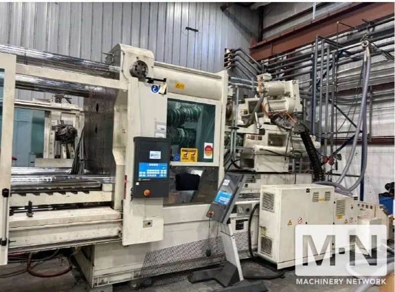 650 TON KRAUSS MAFFEI MODEL CXZL 650-3000/1400/750  THREE SHOT INJECTION MOLDING MACHINE MFG 2010