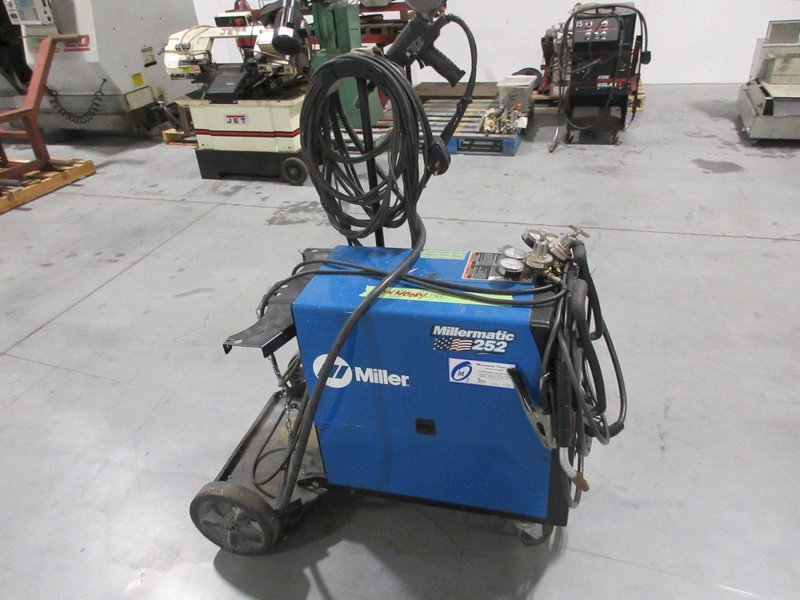 Millermatic 252 MIG Wire Feed Welder with Rolling Base and Accessories, 200/230V Single Phase- Auction Item