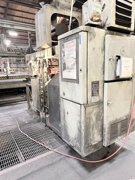 Hunter model hmp 10C automatic molding machine s/n 82P928, op. with Emerson PLC, feed belt