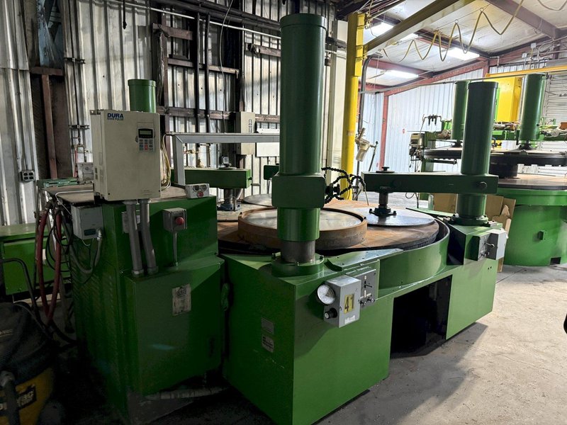 84" SPITFIRE, MODEL 84PNLC, (4) PNEUMATIC HOLD DOWNS, CONDITIONING RINGS, VARIABLE SPEED TABLE, DRIP SYSTEM