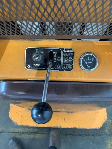 1,500 LB BIG JOE 1518-T-12 ELECTRIC LIFT. STOCK # 0873824