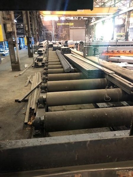 25" X 36" W.F. WELLS INC B-25-2 HORIZONTAL BAND SAW WITH 80' POWERED ENTERY CONVEYOR AND 32' POWERED EXIT CONVEYOR