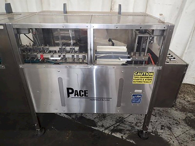 Pace Packaging Omni-Line M400LH S/S Descrambler with S/S Pace Packaging Elevator Conveyor