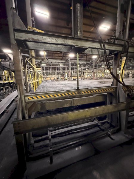 8- air operated pallet line approx. 80' long with air dump and air lifts, 20" x 60" trays, price is for all