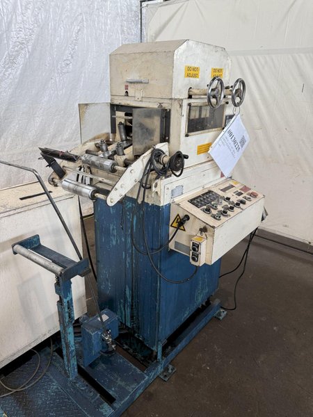 1,100 Lb. x 6" x .05" AIDA SERVO FEEDLINE W/ DUAL UNCOILER. STOCK # 0130225.