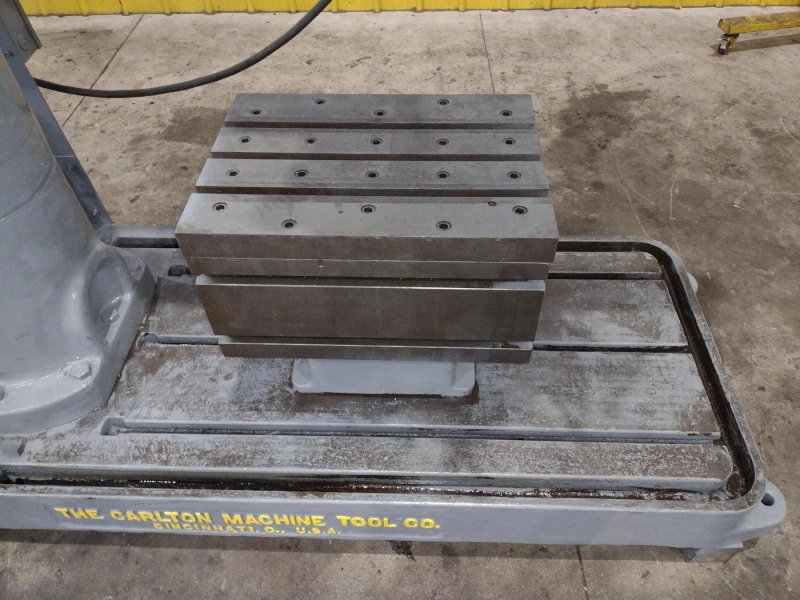 4' X 9" CARLTON 1A RADIAL ARM DRILL. STOCK # 0992325