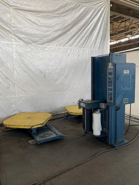 LANTECH V-SERIES DUAL TURNTABLE PALLET WRAPPER. STOCK # 0895024.
