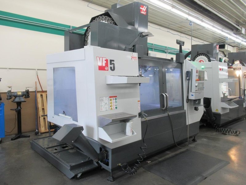 Haas VF-5/50 CNC Vertical Machining Center, Haas NextGen CNC Control, 4th Axis, TSC, Probing, HSM, 30 ATC- Auction Item