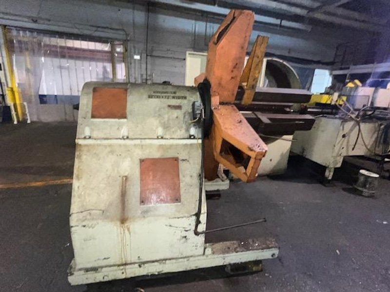 10,000# X 35" SESCO MOTORIZED UNCOILER STOCK# 3871