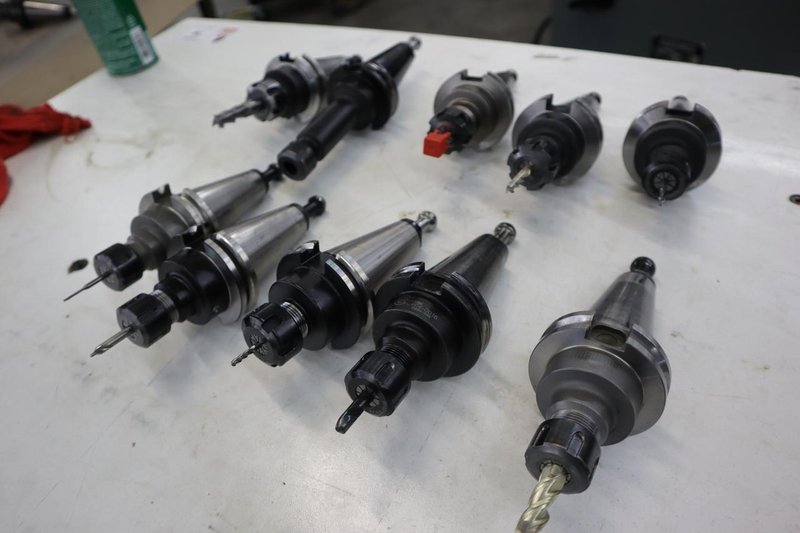 CT40 Taper Tool Holders: (1) ER20 Collet Holder, (9) ER16 Collet Holders- Auction Item