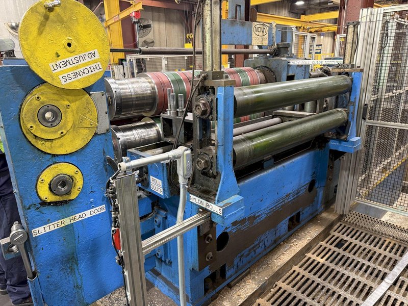 54" WIDE X 40,000 LB X 8" ARBOR LOOPCO SLITTING LINE. STOCK # 0651226