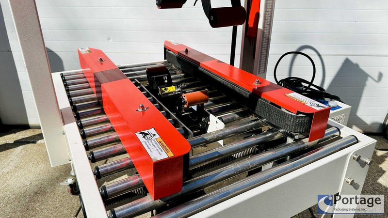 Eagle T100 Carton Sealer  |  Side Driven Belts  |  Top and Bottom 3” Tape Heads  |  Adjustable Carton Sealer