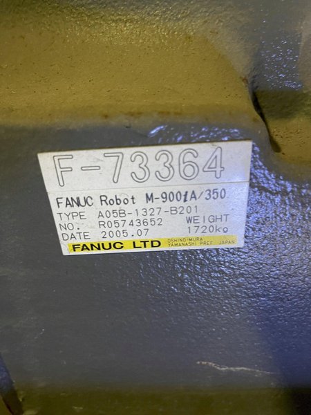 2005 Eagle automated saw and knockout system s/n 05027 with enclosure with light curtain, 2005 Fanuc robot model M-900iA 350 s/n r05743652 with Fanuc system R-J3iB controls s/n e05608535, with saw grips, Eagle enclosure with core knockout system, Allen Bradley plc with panelview 700, core butt discharge conveyor with drive, gate and riser dropoff, related conveyors