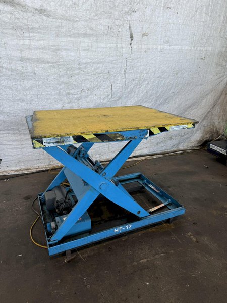 3,000 LB X 36" X 36" SOUTHWARK LIFT TABLE. STOCK # 0894824.