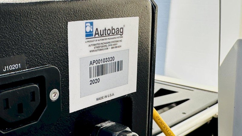 Automated Packaging Systems | Autobag 600 Bagger System  |  Vertical Orientation for Package Fulfilment with Powered Outfeed Conveyor