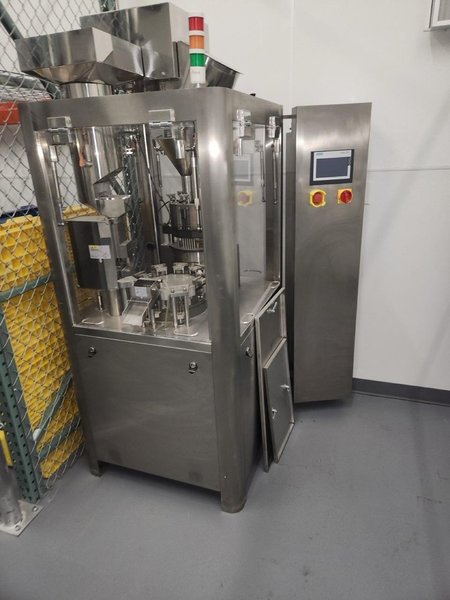 APM-USA Encapsulation Line, 2020 – Filler, Counter, Capper, Labeler, Sleeve Shrink, Sealer, Conveyors