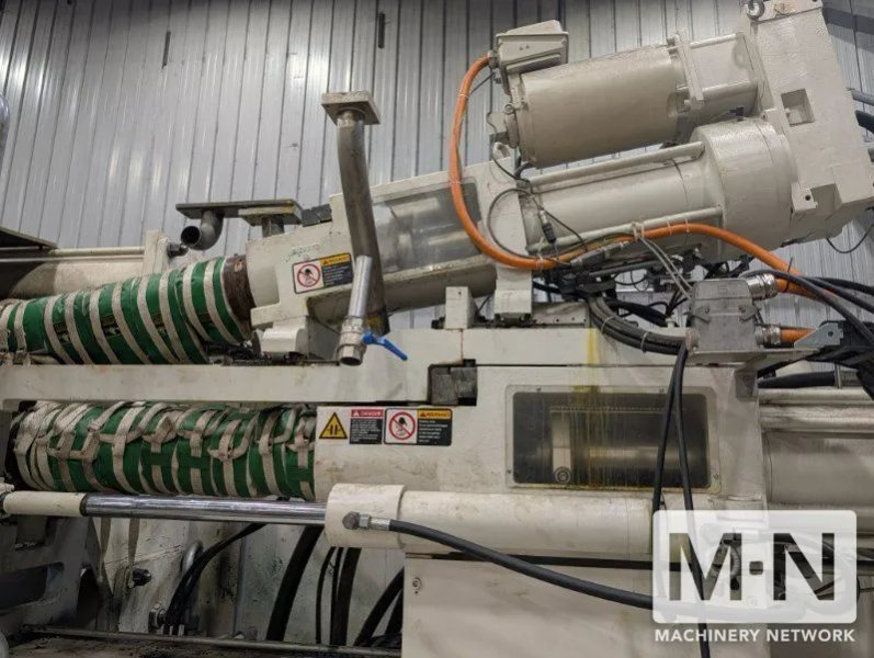 650 TON KRAUSS MAFFEI MODEL CXZL 650-3000/1400/750  THREE SHOT INJECTION MOLDING MACHINE MFG 2010