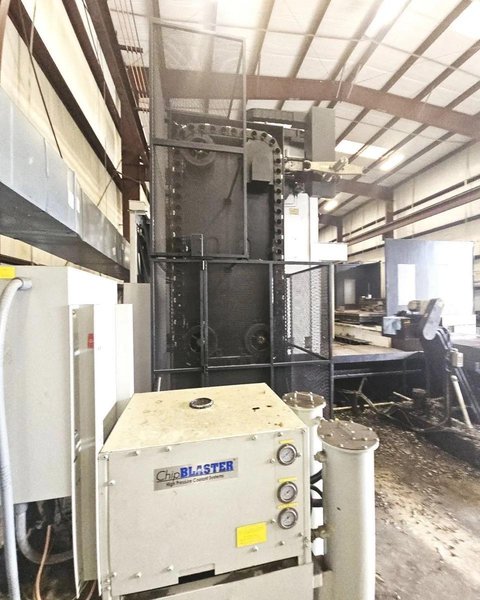 Kuraki AKB-13 5″ Spindle Horizontal Boring Mill, 2015 – Fanuc 0iMB Control 5 Axis Control, 60 ATC, 1000 psi TSC, Rigid Tap, Full B Axis 360 Degree Rotary Table, Barnes Chip/Coolant Separator w/ Lift Up Conveyor