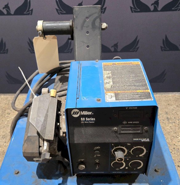 MILLER CP-302 MIG WELDER WITH MILLER 60 SERIES WIRE FEEDER USED