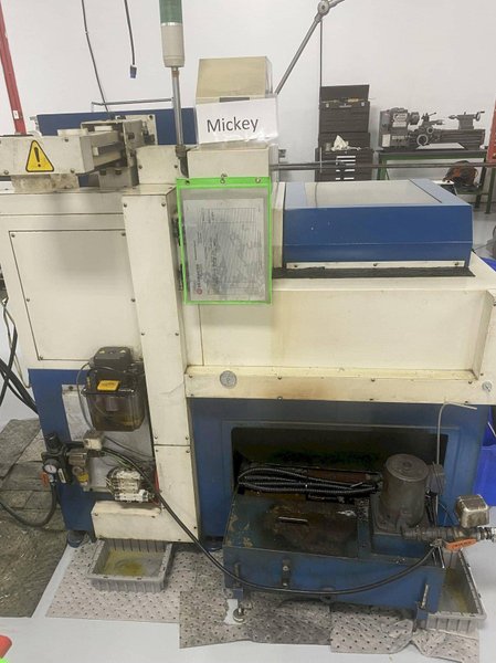 Nexturn SA-12 CNC Swiss Lathe, 2002 – BWG Bar Loader, Fanuc Control