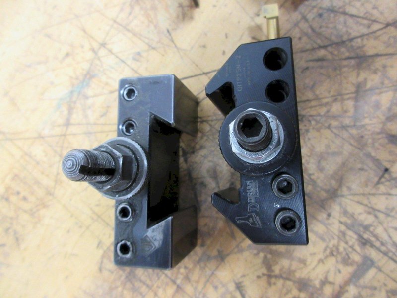 Manual Lathe Tooling, (3) Dorian QITP25-N and (1) Aloris AXA 1 Tool Post Holders, Jacobs Keyed Chuck &amp; Live Center with #2 MT, Royal Live Center 1" Straight Shank- Auction Item