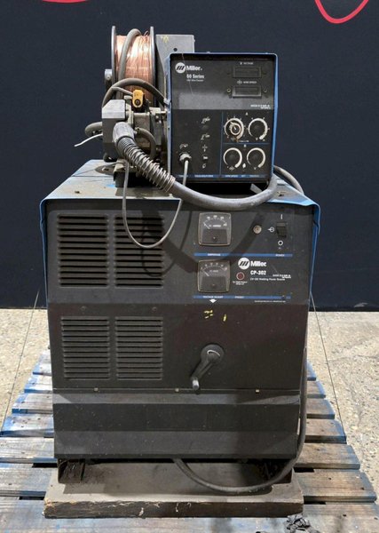 MILLER CP-302 MIG WELDERWITH 60 SERIES 24V WIRE FEEDER USED