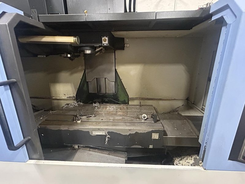 Doosan DNM 500 VMC, 2009 – 4th Axis Wired, Fanuc Control