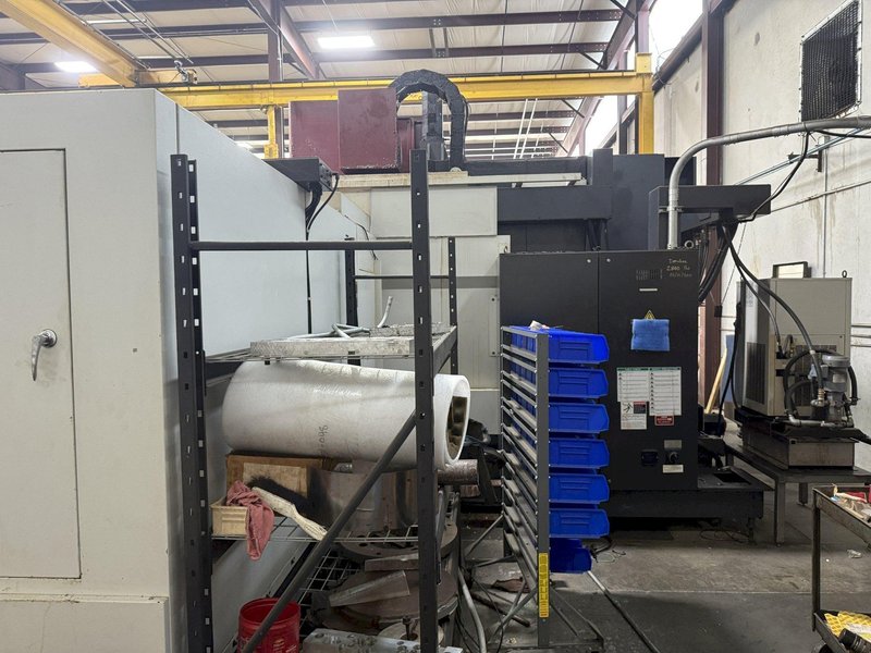OKK, MODEL KCV 800 CNC VERTICAL MACHINING CENTER, 120" X, 33" Y, 28" Z, 40 ATC, 12,0000 RPM, 2007, EXC.