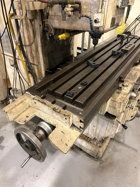65" X 15" OKK MH-3VII 10HP VERTICAL MILLING MACHINE. STOCK # 1085526