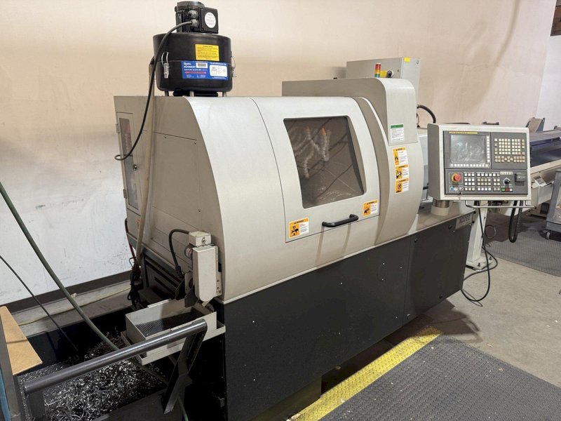 Hanwha XD26II CNC Swiss Lathe, 2016 – Bar Feeder, ChipBlaster Coolant System, Tooling, Low Hours