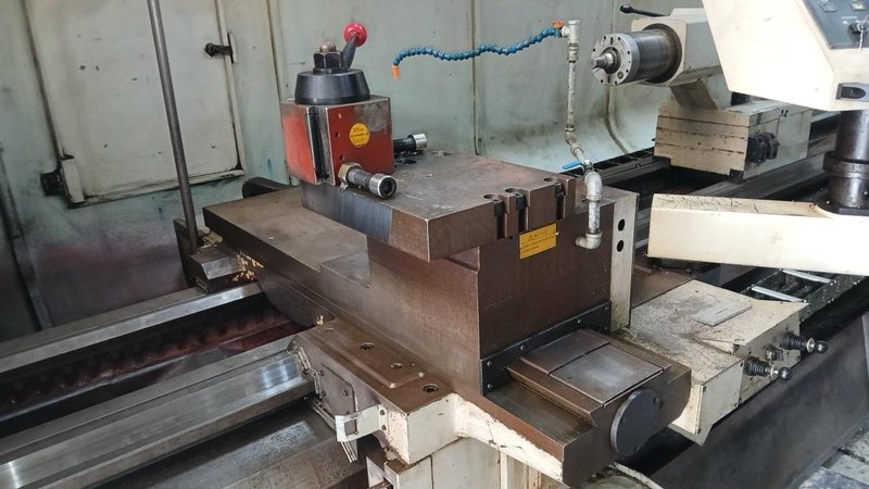 37.4″ x 156″ Hankook Protec 9NC 10″ Spindle Bore, Dual Chucks, 2006 – Chip Conveyor, 8 Station Turret