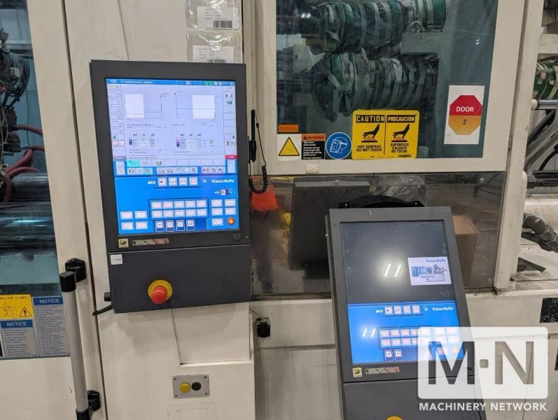 650 TON KRAUSS MAFFEI MODEL CXZL 650-3000/1400/750  THREE SHOT INJECTION MOLDING MACHINE MFG 2010