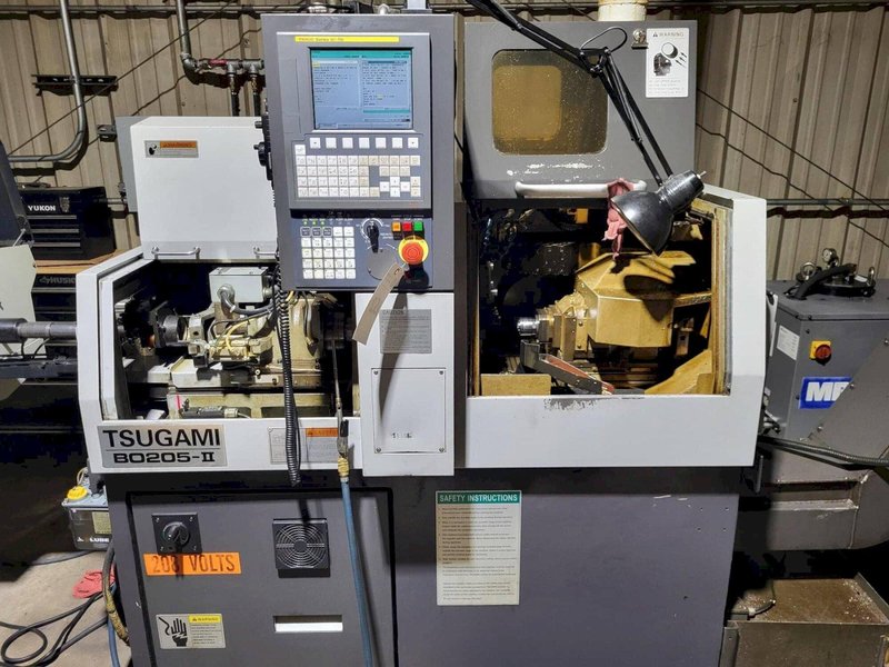 Tsugami B0205-II 5-Axis CNC Swiss Lathe, 2013 – Fanuc OI-TD Control, Edge Bar Feeder, High Pressure Coolant, Chip Conveyor