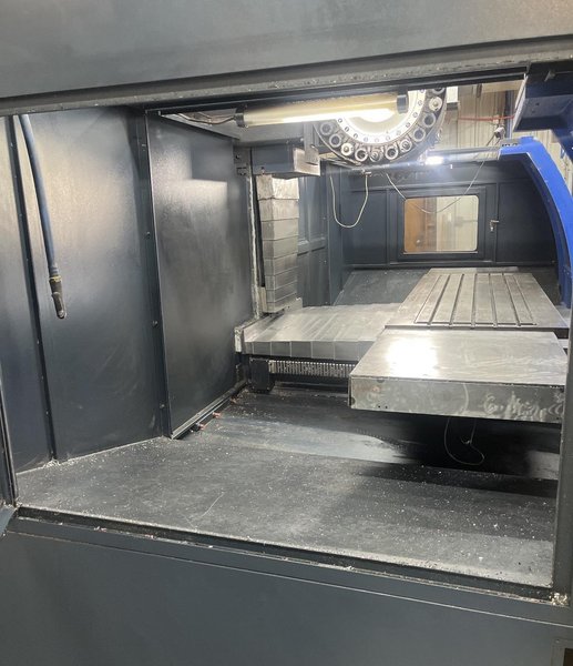 2019 MILLTRONICS RH33 Large Travel Vertical Machining Center with Arm ATC and Full Enclosure